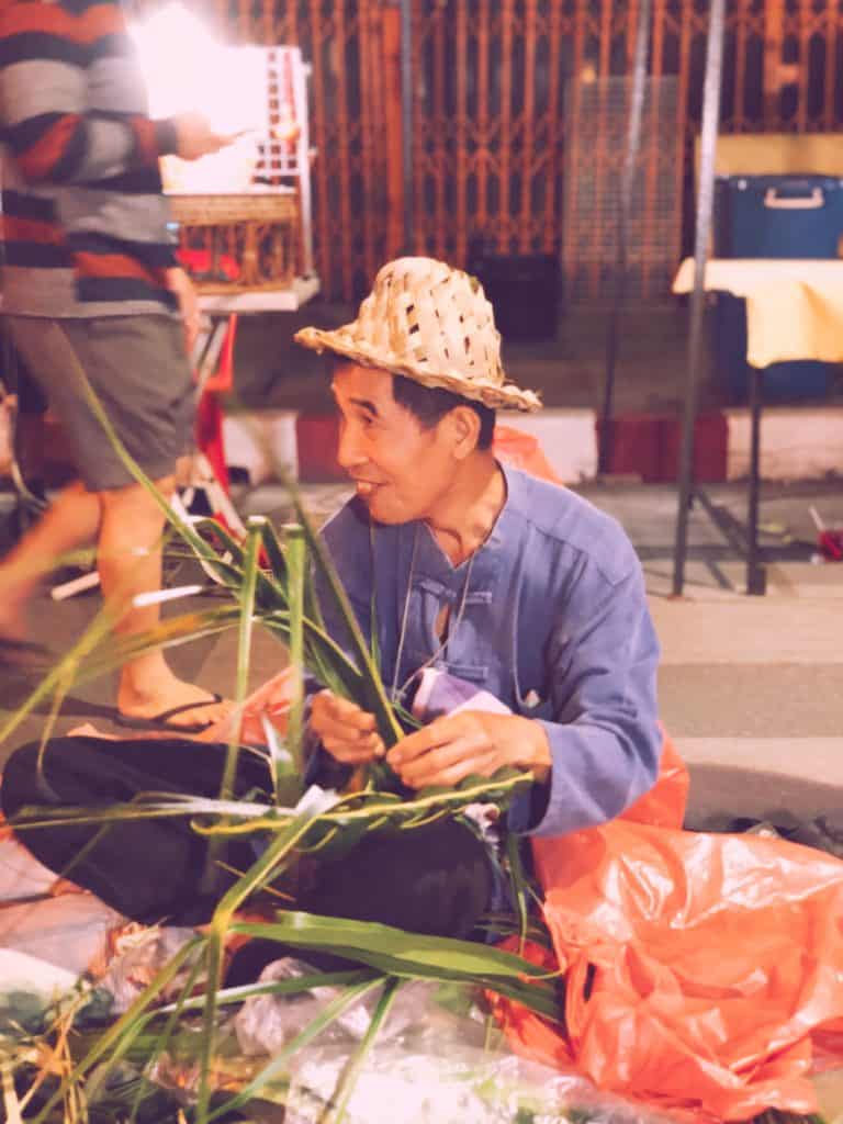 Man making a hat at one of the Chiang Mai Street Markets