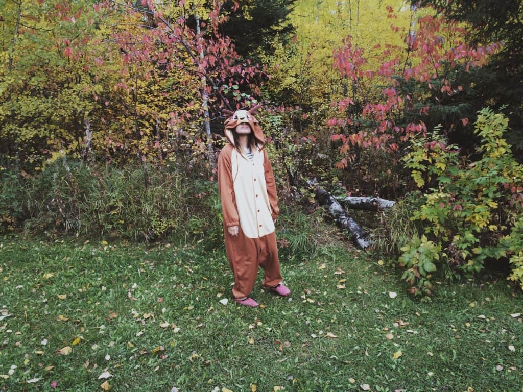 Girl wearing a deer onesie